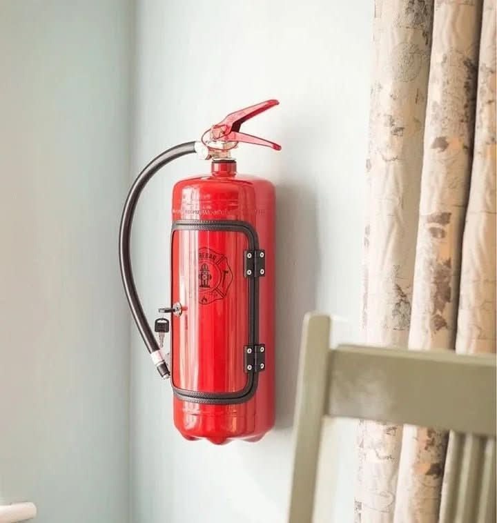 Hidden Drinks Cabinet in Fire Extinguisher Design